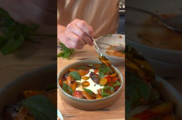 Seared Peaches, sungold tomatoes, basil, on whipped ricotta with chorizo chili oil.