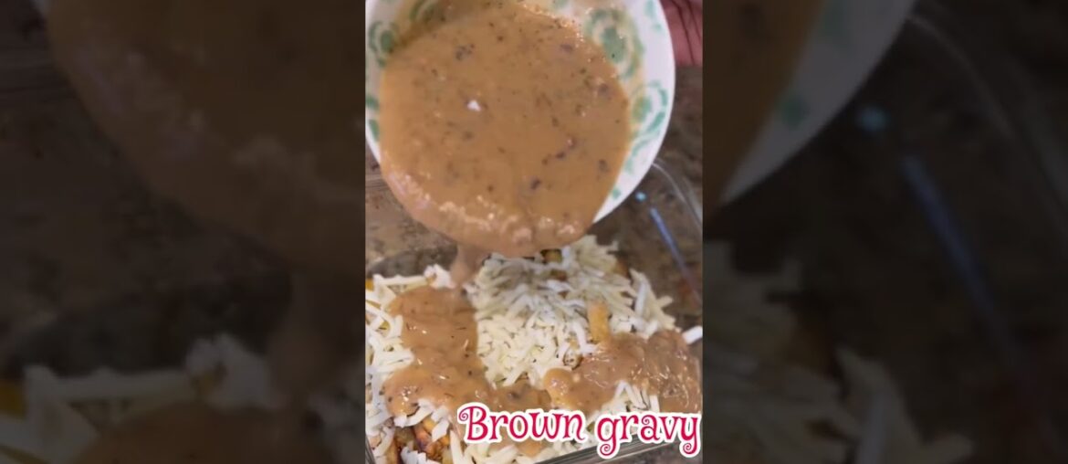 Authentic Canadian poutine recipe made of French fries topped with cheese and gravy