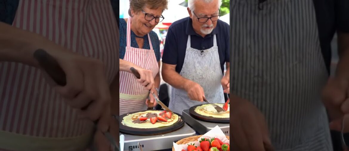 “French Grandparents with Dog Making Crepes at Summer Fair” #grandmacooks