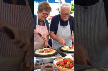 “French Grandparents with Dog Making Crepes at Summer Fair” #grandmacooks