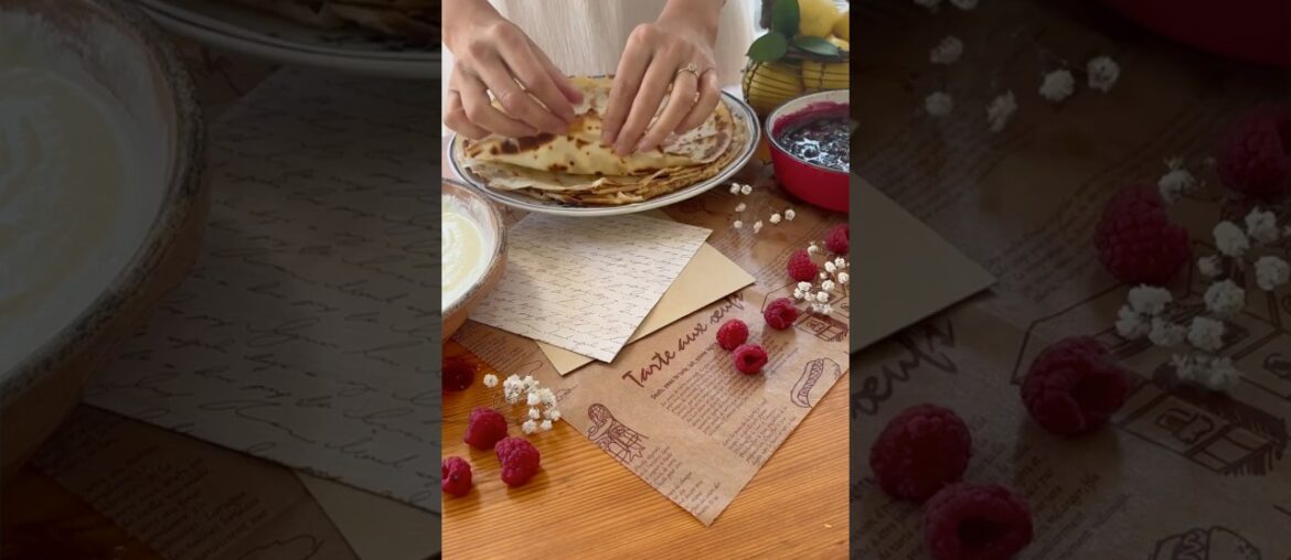 French crepes with ricotta cheese and berry sauce French crepes with ricotta cheese and berry sauce