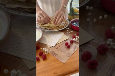 French crepes with ricotta cheese and berry sauce