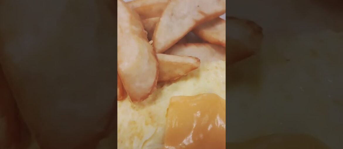 Cheese omletee with french fries breakfast yummy