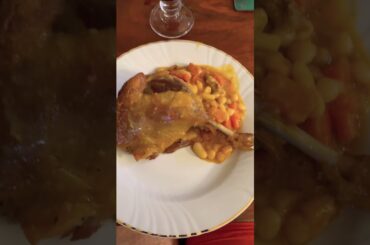 French Cassoulet - divine confit of duck leg over beans cooked with duck fat.