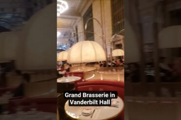 Grand Brasserie inside Grand Central terminal dining area open to concourse & a private inner room.