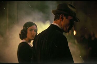 A glass of wine, a candle, and French jazz