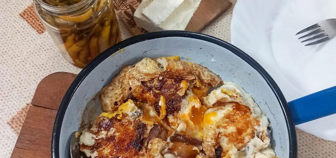 Breakfast in Serbia - scrambled eggs, bacon, cheese, pfefferoni, garlic