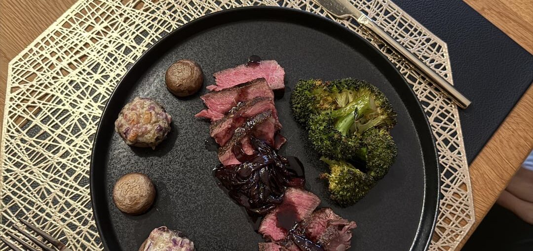 Porterhouse Steak with Roasted Broccoli and Stuffed Champignons