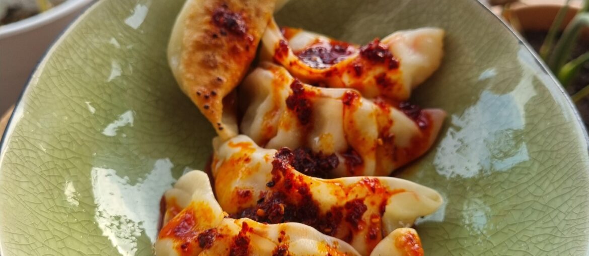 Chicken gyoza crispy with chili oil