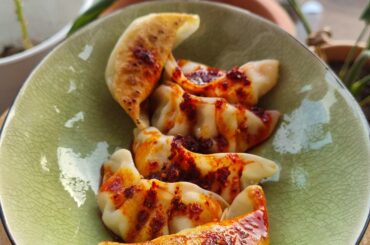 Chicken gyoza crispy with chili oil