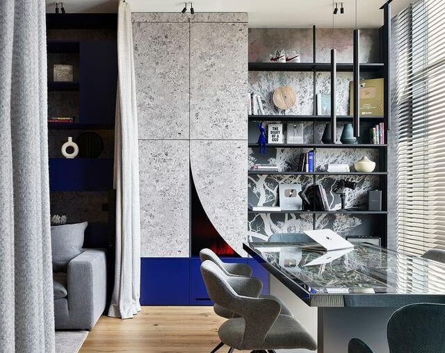 Workspace with custom terrazzo cabinetry, a glass desk, and oak flooring, Barcelona, Spain [640x853]