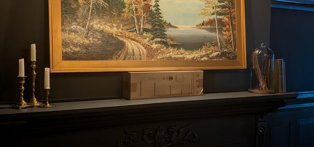 How high should I hang this painting? Right now it's sitting on a box, 5.5 inches above mantle.