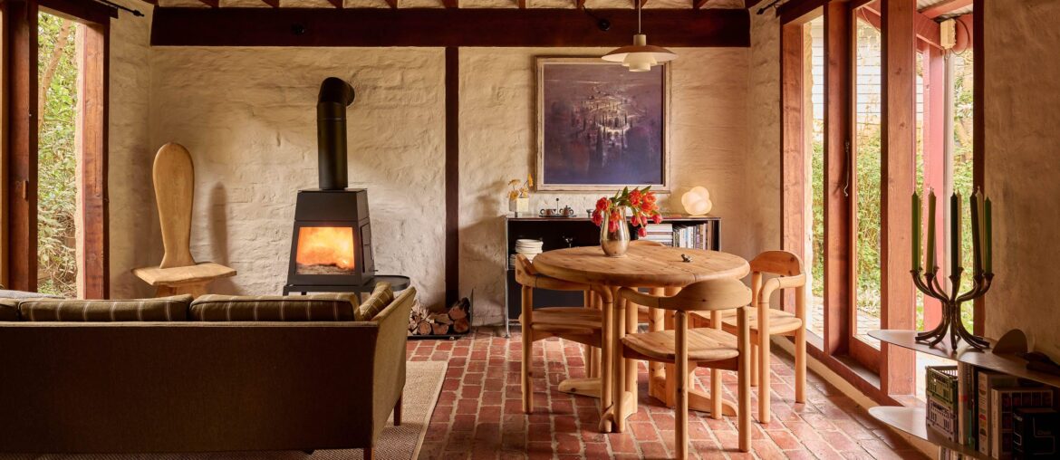 Living space with mudbrick walls and red-brick paved flooring, Eltham, Melbourne, Victoria, Australia [4000x2000]