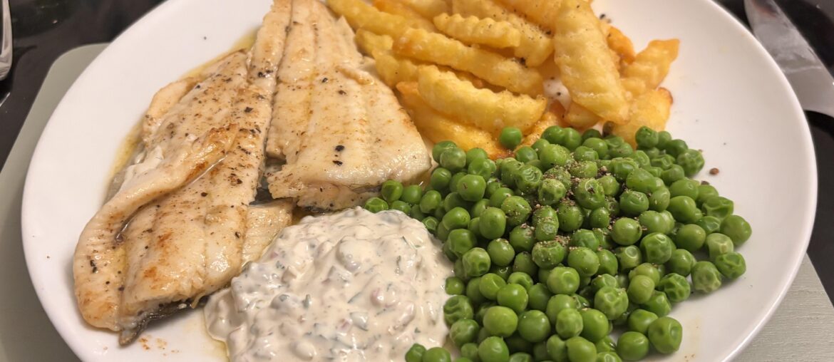 Plaice fillet fried in butter with homemade tartare sauce, chips n peas