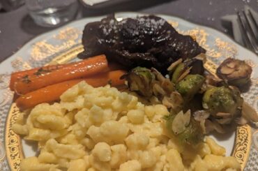 Rindsrouladen with Spätzle, caramelized carrots and pan fried brussels sprouts with sliced almonds