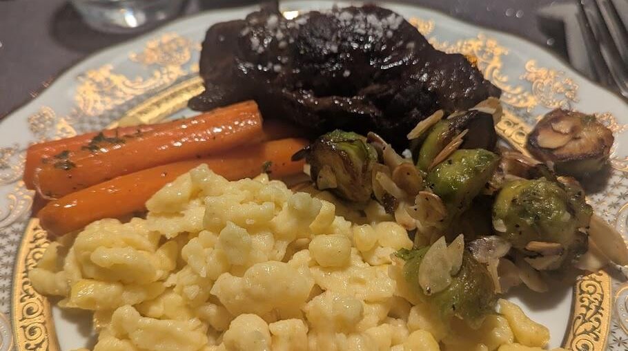 Rindsrouladen with Spätzle, caramelized carrots and pan fried brussels sprouts with sliced almonds