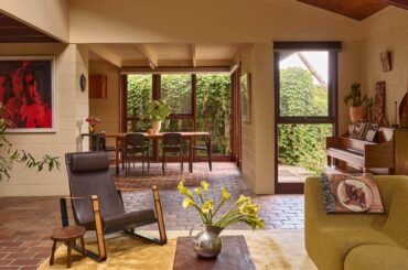Living and dining space in a renovated 1970s residence originally designed by architect Alan Hough, Balwyn North, Melbourne, Victoria, Australia [4000x2249]