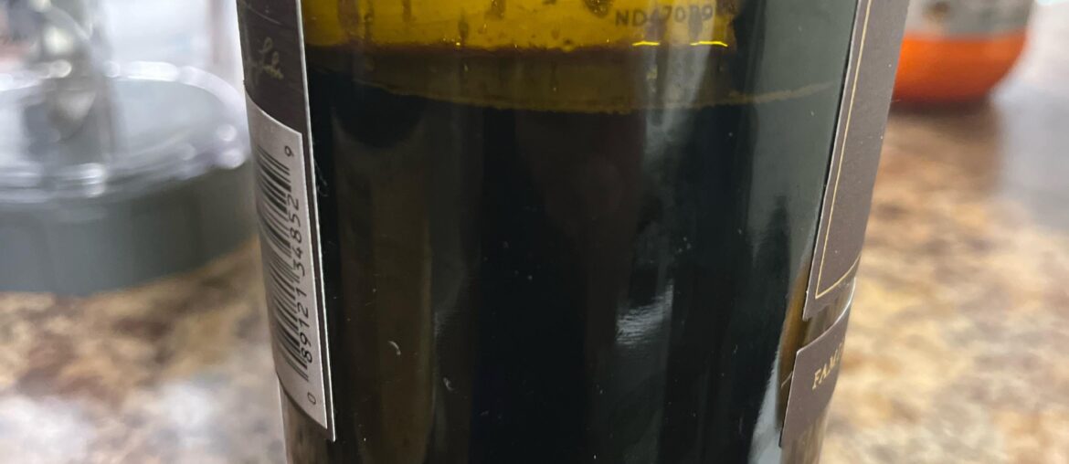 Wine cap fell into liquid.