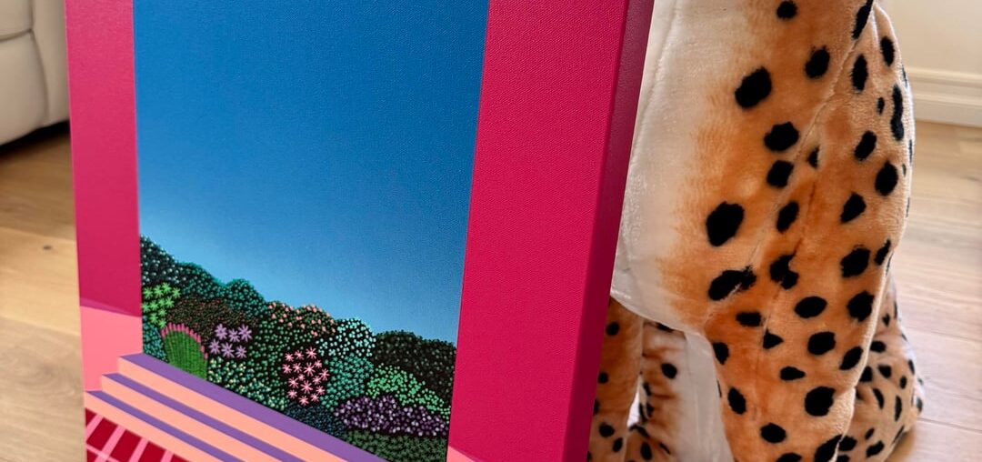 My pet cheetah in our living room standing next to my newest painting