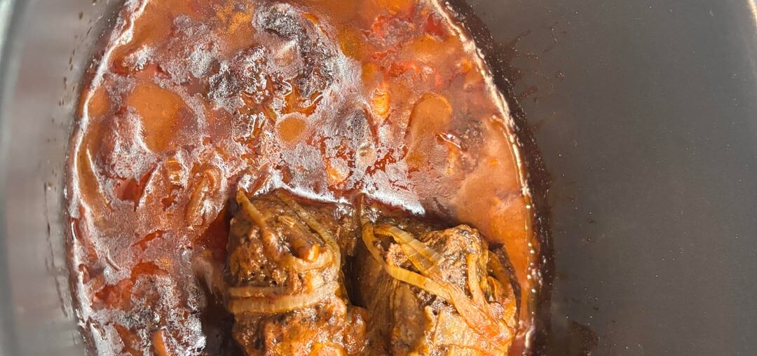 Slow cooker beef shin with mash and a little cabbage.