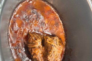 Slow cooker beef shin with mash and a little cabbage.