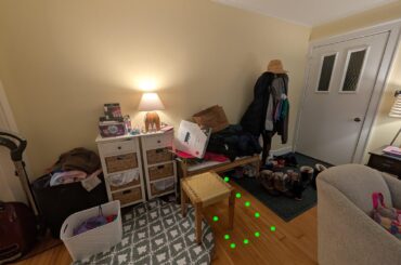 Another rug to extend entry to the yellow stool. Other side and centered on the threshold circular braided rug.