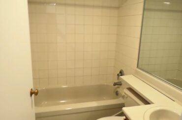 How to make this apartment bathroom look cozy and comfortable