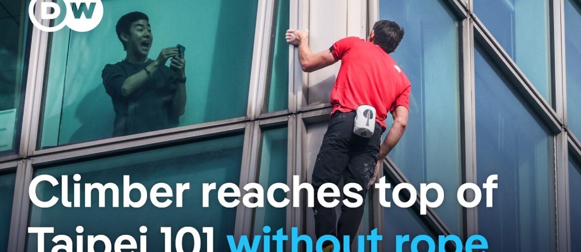 US climber Alex Honnold completes rope-free climb up Taipei 101 skyscraper | DW News