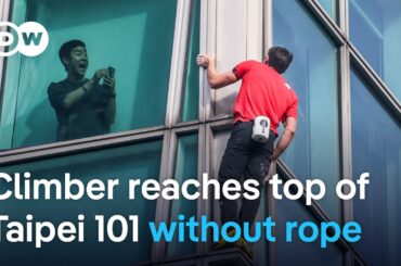 US climber Alex Honnold completes rope-free climb up Taipei 101 skyscraper | DW News