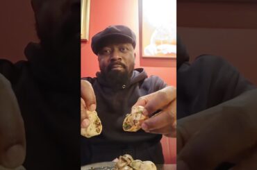 Escargot (Snails)— a classic French delicacy with garlic butter and parsley.