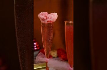 Meet the starry eyed 75 – a gin French 75 topped with a cotton candy glitter bomb ✨🥂 #cocktail