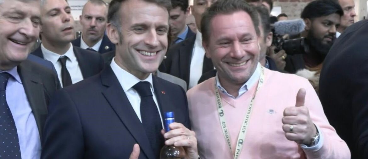 Macron receives a bottle of wine with 'For Sure' label inspired by his viral Davos appearance | AFP