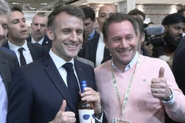 Macron receives a bottle of wine with 'For Sure' label inspired by his viral Davos appearance | AFP