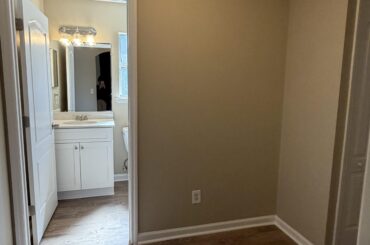 How can I fit a vanity and storage space here?