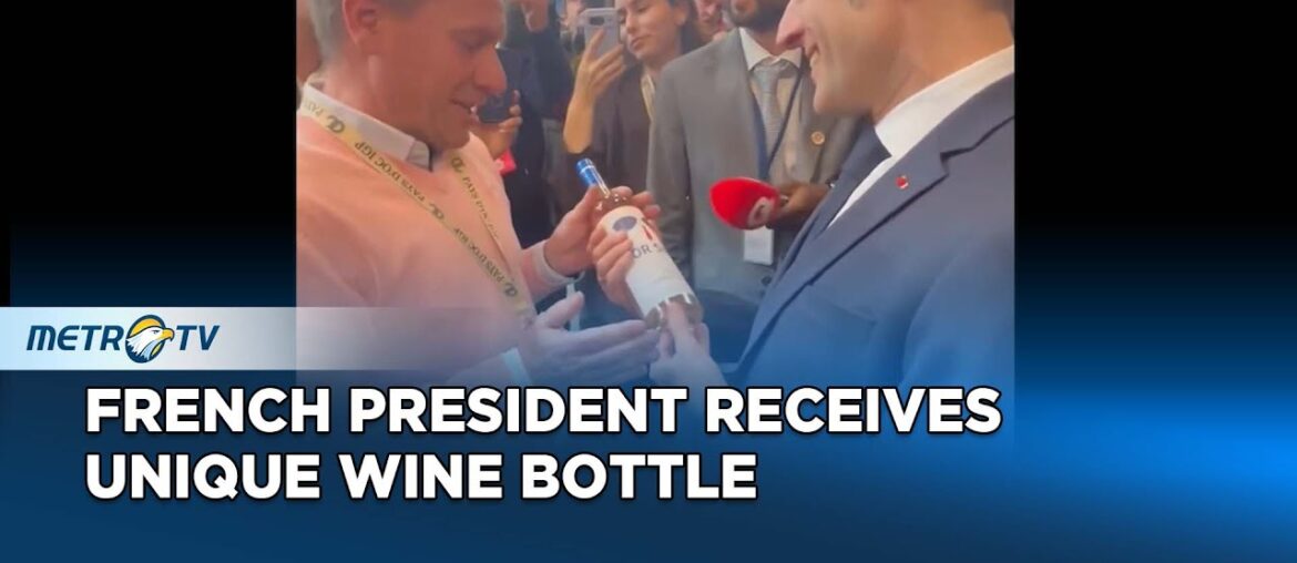 Macron Receives Playful Wine Gift at Paris Wine Event