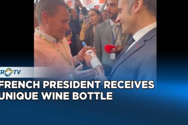 Macron Receives Playful Wine Gift at Paris Wine Event