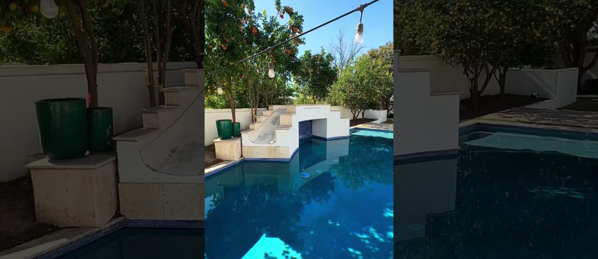 French Chateau in The Pecans! 6760sf, spa suite, infinity pool w/ slide, gourmet kitchen & casita!