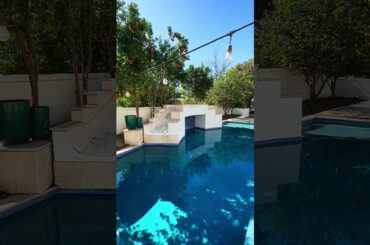 French Chateau in The Pecans! 6760sf, spa suite, infinity pool w/ slide, gourmet kitchen & casita!