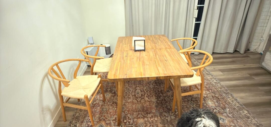 Rug covering entire dining area Rug covering entire dining area