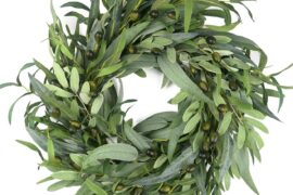 How can I hang this up on the inside but so you can see it from outside? We live in a new construction area and there is so much dust. I have a big glass window in my door so how can I hang this so you can still see the wreath through the window (facing outward) but keep it clean?