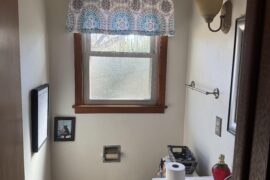 How to make this little bathroom look better.