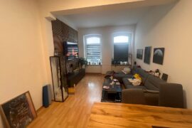 How could we make this living room seem more cozy? We arent really the creative type