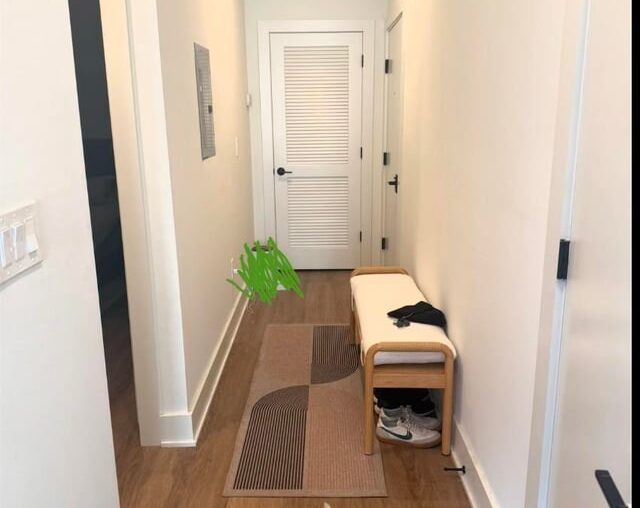 Which side for entry bench, pic 1 or 2? Front door is the door to the right. Door straight ahead with slats is unused utility closet.