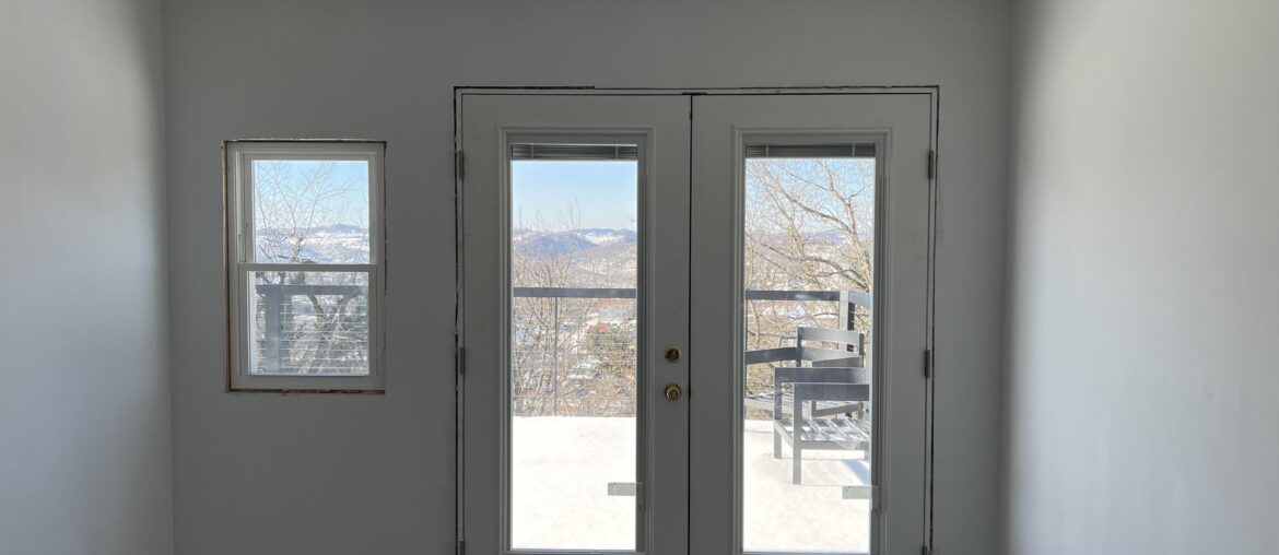 Where does the curtain rod go?