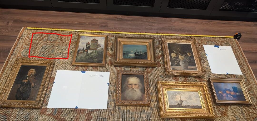 Hey ya'll. So I started to create a gallery wall (2nd photo) but it felt way too precise and just off. Does this set up look better to you?