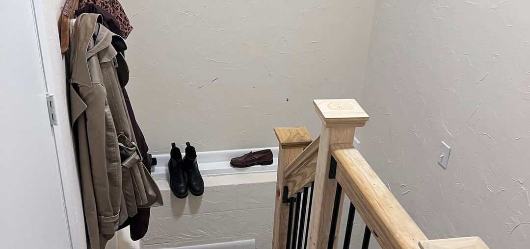 Ideas for making this mudroom area less messy?