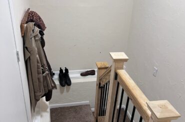 Ideas for making this mudroom area less messy?