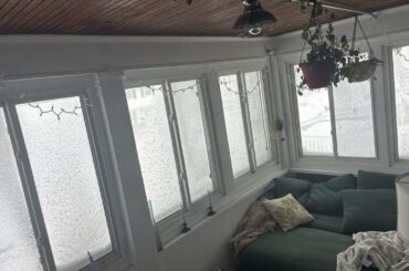 Accepting suggestions for curtains in our sunroom/entry way.