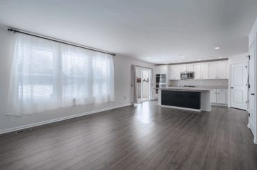 Millennial greige vinyl plank hell - how can I make this work?