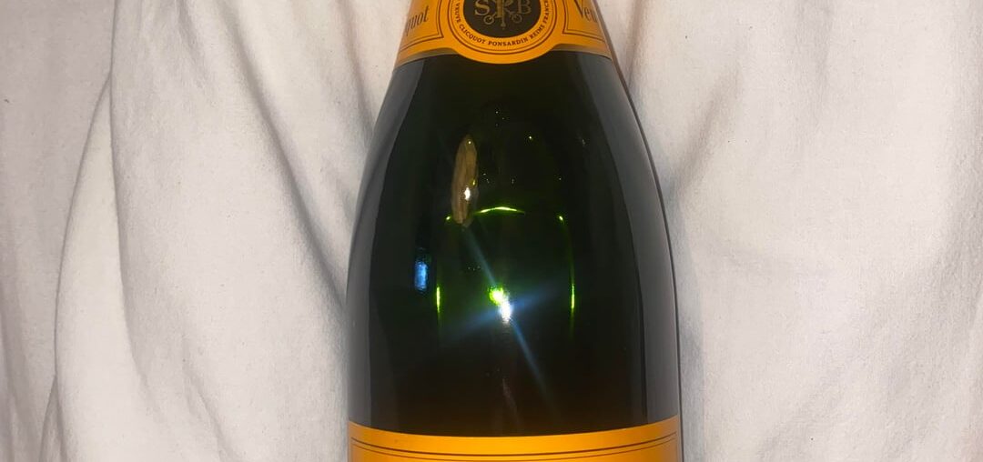 I have these bottles of veuve cliquot, can someone help me with how old these are/worth?